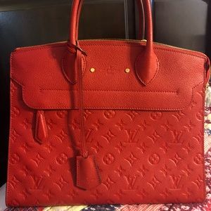 Red Authentic Louis Vuitton and matching wallet!